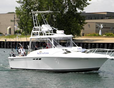 white-boat-corkscrew-driving-on-lake-michigan