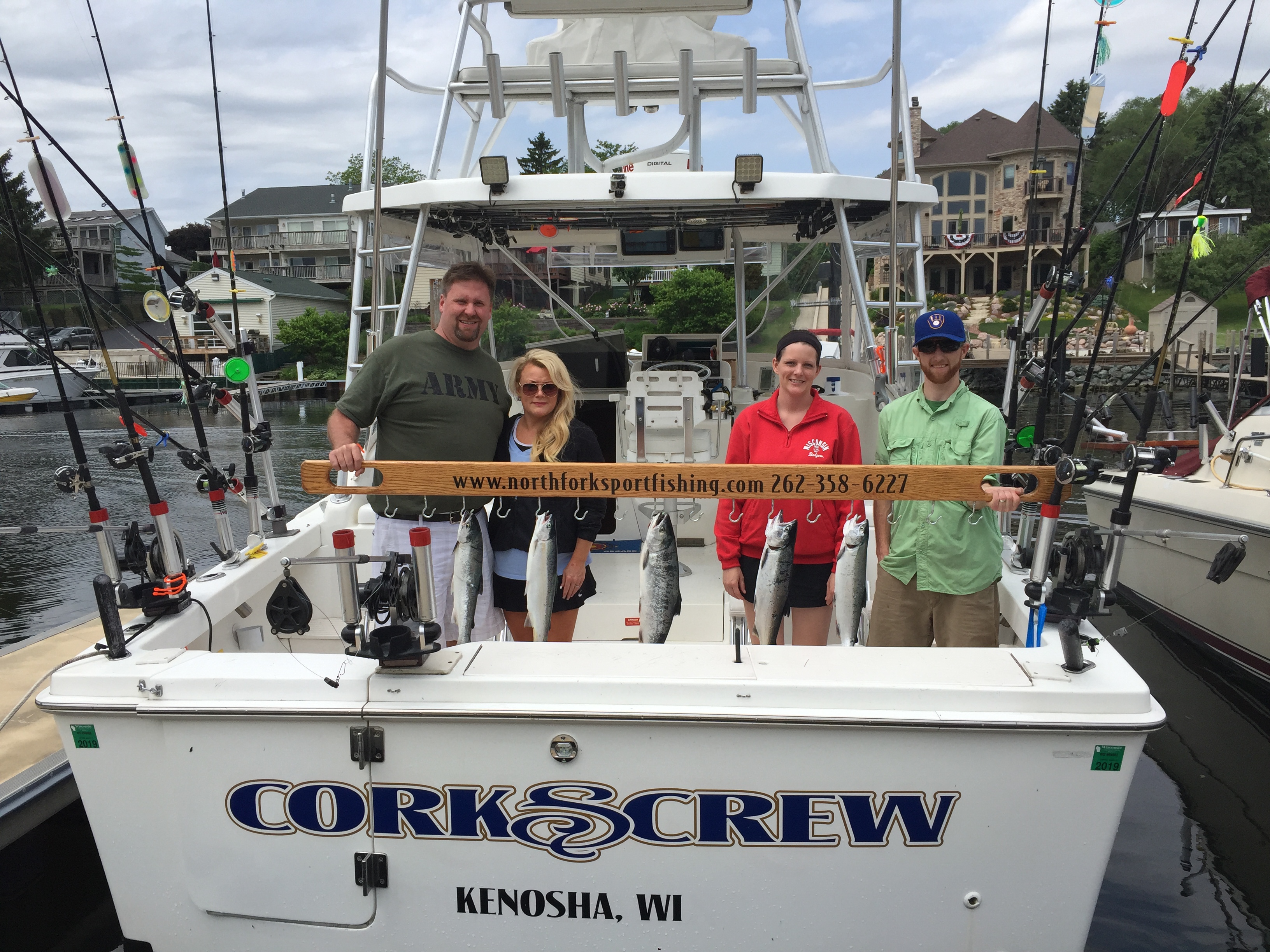 2-couples-on-charter-fishing-with-trout